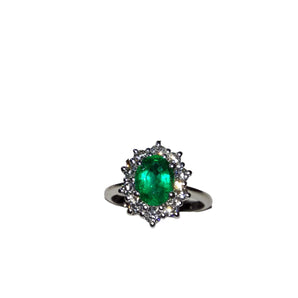 Anello in oro bianco con smeraldo e diamanti