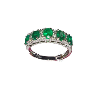 Anello in oro bianco diamanti e smeraldi