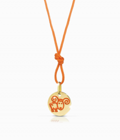 Pendente medaglia in oro con disegno ariete in smalto arancione